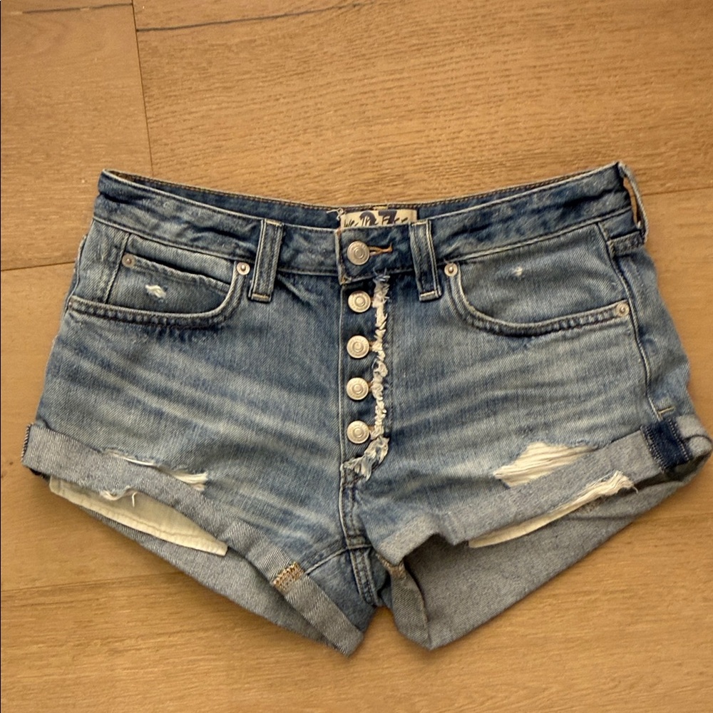 We The Free Distressed Light Blue Denim Button-Front Shorts
